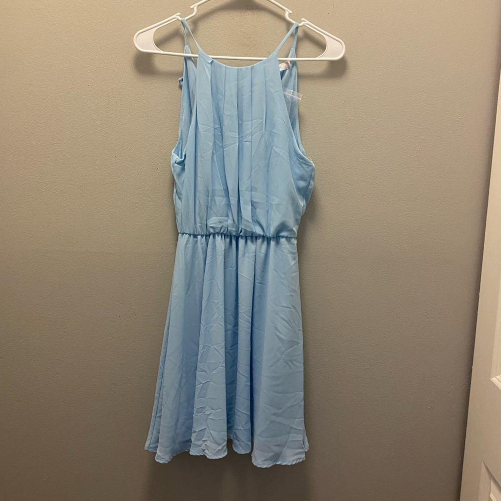Size Small, New Without Tags does have extra button in bag attached to label.